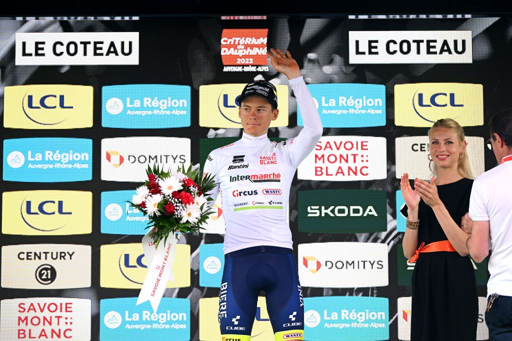 LE COTEAU FRANCE JUNE 06 Rune Herregodts of Belgium and Team Intermarch Circus Wanty celebrates at podium as White best young jersey winner during the 75th Criterium du Dauphine 2023 Stage 3 a 1941km stage from MonistrolsurLoire to Le Coteau UCIWT on June 06 2023 in Le Coteau France Photo by Dario BelingheriGetty Images