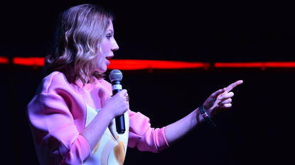 Katherine Ryan on stage. 