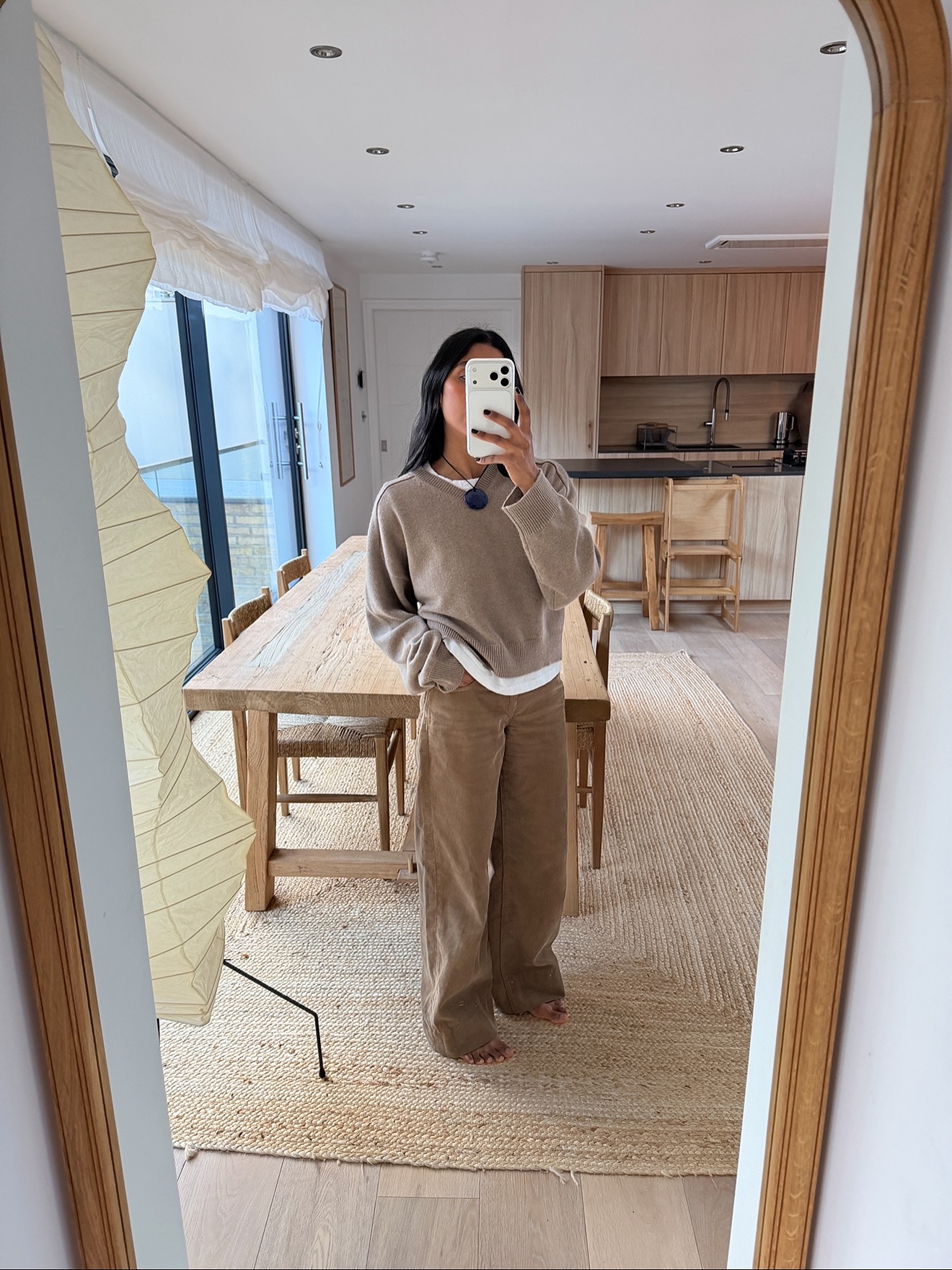 Monikh Dale wears a pair of brown denim cord trousers