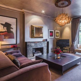 living room with fire place and carpet flooring