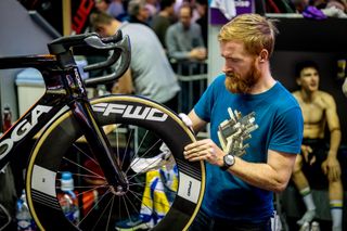 A mechanic works on a bike prior to the Men's elite track cycling on day one of the 81st 6 Days Gent 2022 at The Kuipke Velodrome