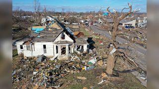 In this aerial view of Mayfield, Kentucky, homes are shown badly destroyed after a tornado ripped through the area overnight Friday, Dec. 10, 2021.