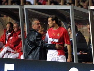 Dado Prso is congratulated by coach Didier Deschamps after scoring four goals for Monaco in an 8-3 win over Deportivo La Coruña in the Champions League in November 2003.