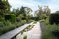 The rill, by Max Askew, is edged with riven slate and descends via two shallow terraces.