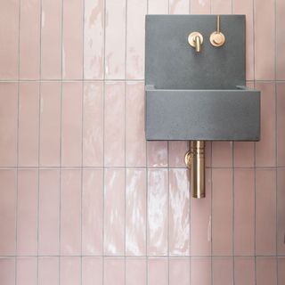 bathroom tiles with black basin