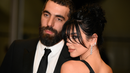 Dua Lipa and Romain Gavras attend the "Omar La Fraise (The King of Algiers)" red carpet during the 76th annual Cannes film festival at Palais des Festivals on May 19, 2023 in Cannes, France.