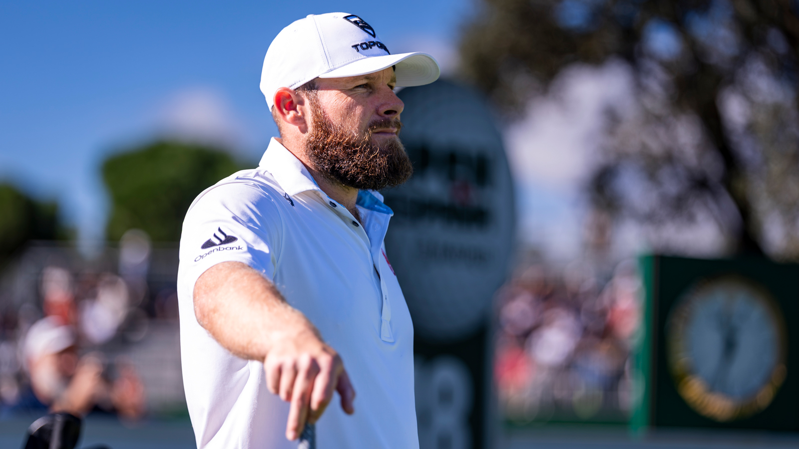 Tyrrell Hatton waits to tee off