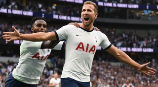 Harry Kane of Tottenham Hotspur celebrates with teammate Danny Rose after scoring his team's second goal during the Premier League match between Tottenham Hotspur and Aston Villa at the Tottenham Hotspur Stadium on August 10, 2019 in London, United Kingdom.