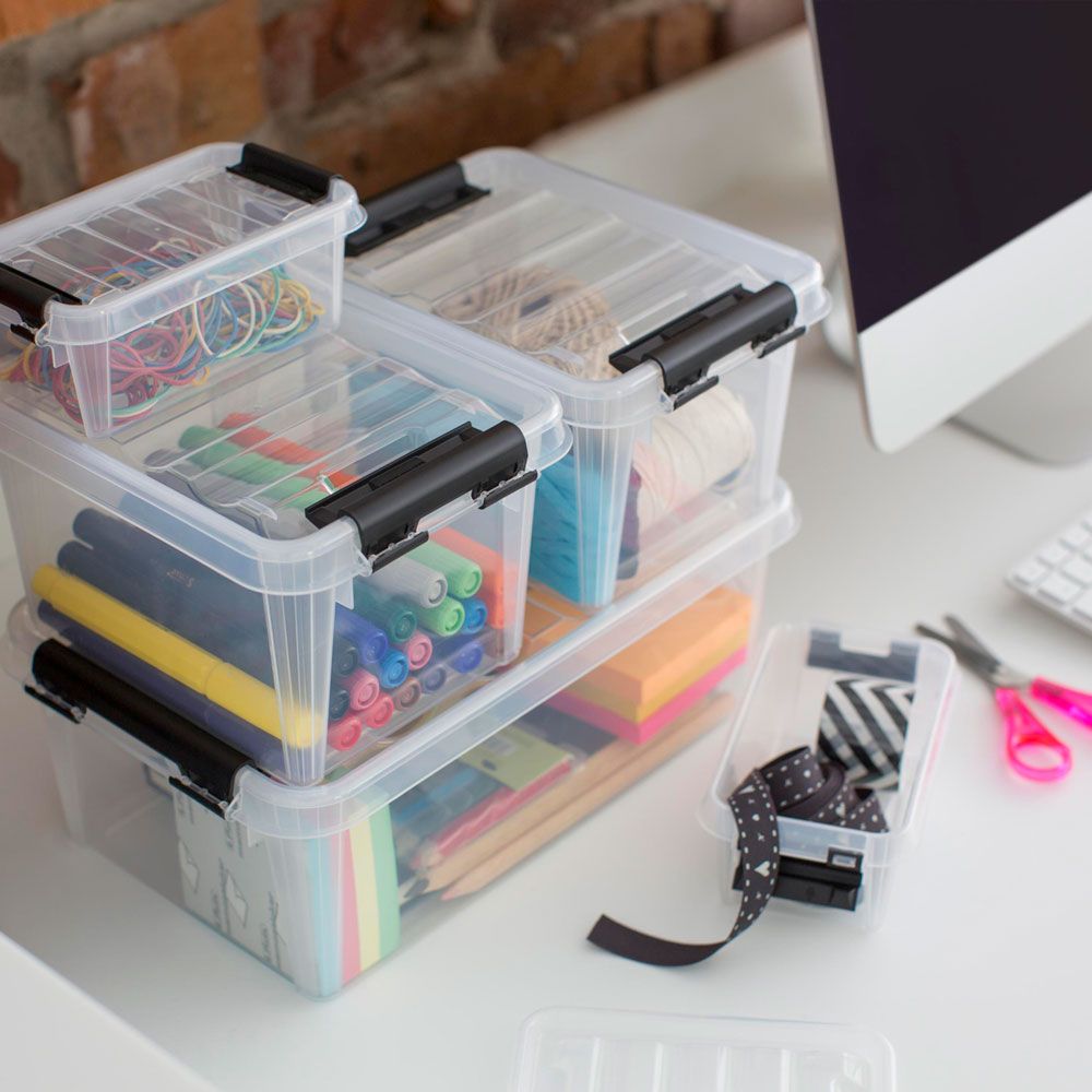 storage boxes on white desk