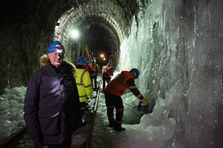 Chris in a tunnel being cleared of ice
