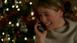 A woman crying on the phone during the Lost Christmas episode "The Constant".