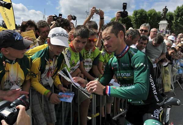 Thomas Voeckler (Europcar) signs autographs prior to the start of stage 10.