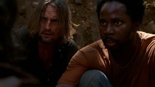 Josh Holloway on the left, sitting with Harold Perrineau in Lost