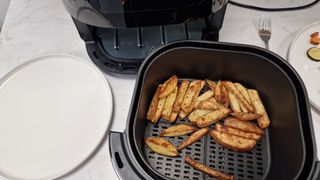 Completed fries in the Philips Essential Air Fryer XL