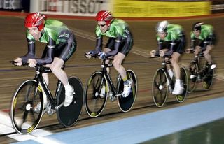 Led by Dermot Nally, the Irish team pursuit squad ride the Manchester boards