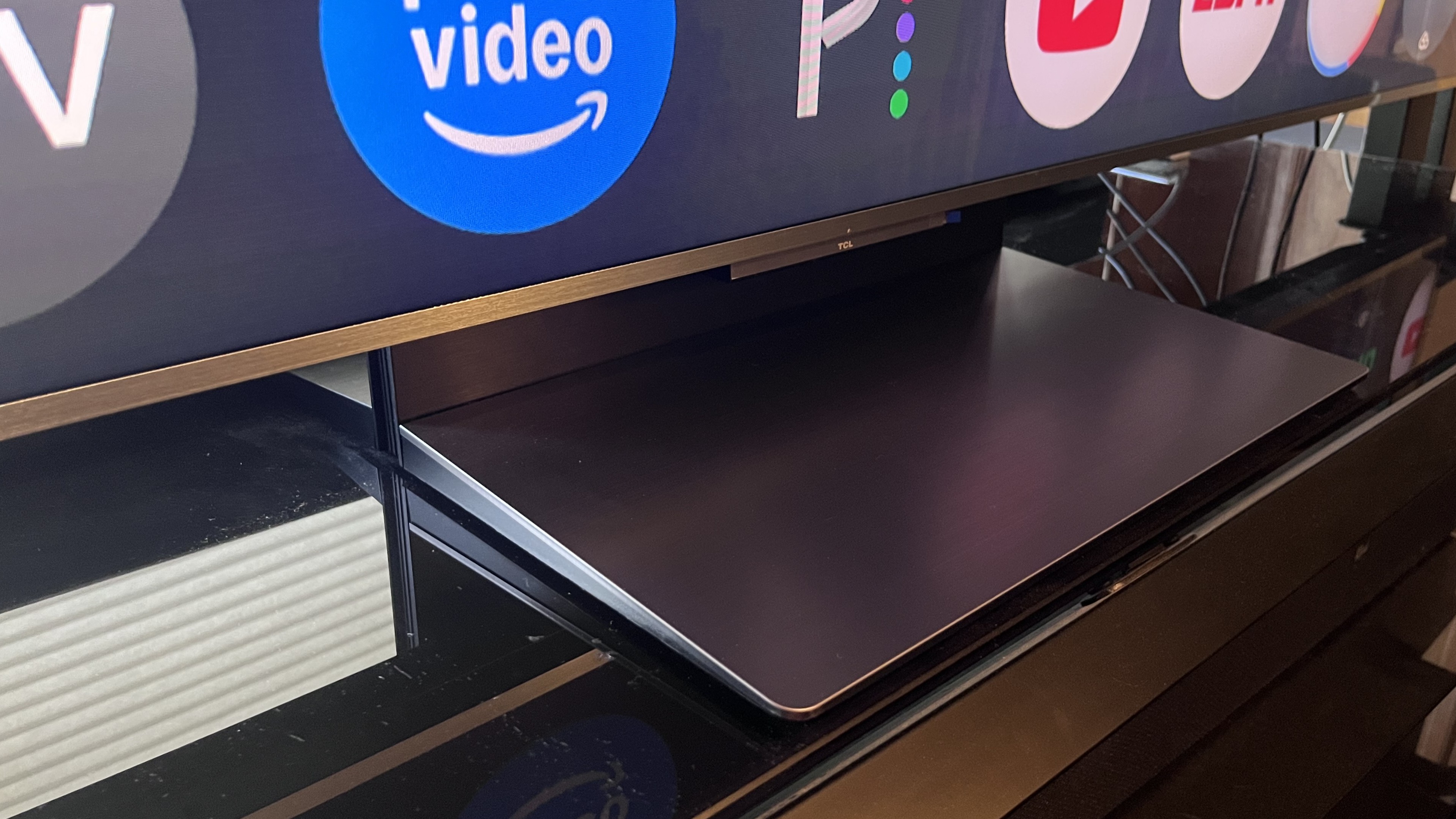 TCL QM9K pedestal stand on TV stand