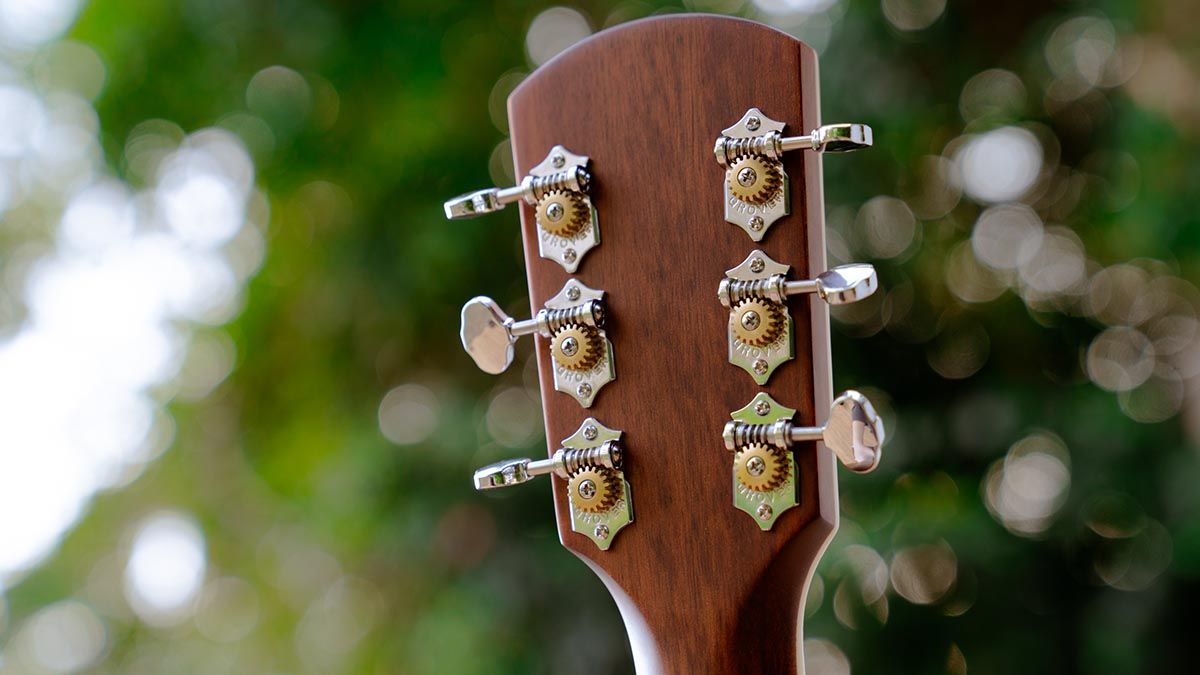 Orangewood Juniper, a parlour-sized acoustic fitted with a rubber bridge and a rail humbucker