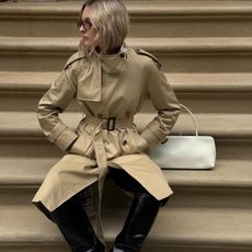 Christie Tyler in a Burberry trench coat