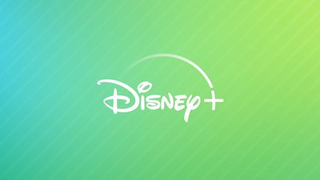 Disney+ logo on a green yellow background