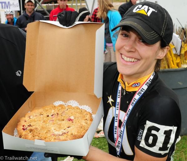 Andrea Smith (Ladies First Racing) is awarded a fresh baked pie in addition to her medal