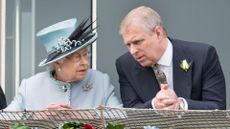 Queen Elizabeth II and Prince Andrew watch the racing at The Investec Derby Festival, 2013