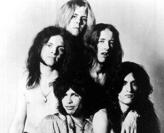 Aerosmith posing for a photograph in the early 1970s