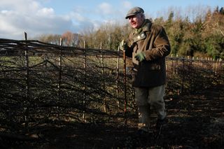 Britain's Prince Charles, Prince of Wales attends a hedge-laying event at Highgrove Estate on December 4, 2021 near Tetbury, Gloucestershire
