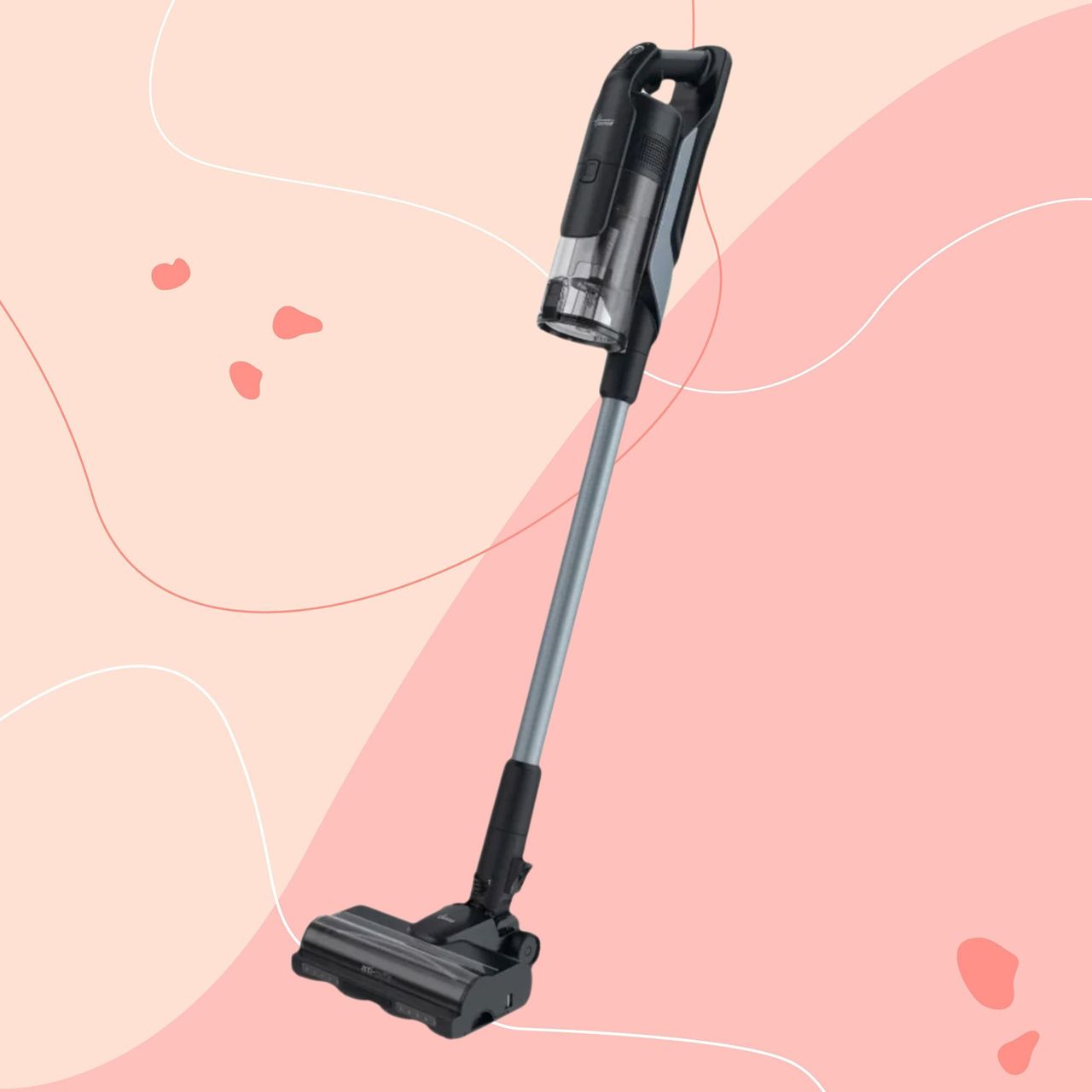 Hoover HF6 Turbo Sense Pet Cordless Vacuum on a pink background