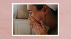  A woman is pictured applying skincare to her cheeks with her hands/ in a pink template