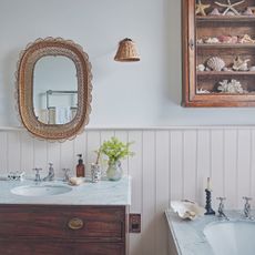 Coastal bathroom with shiplap and wooden units