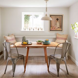 dining room with wooden table and tolix chairs