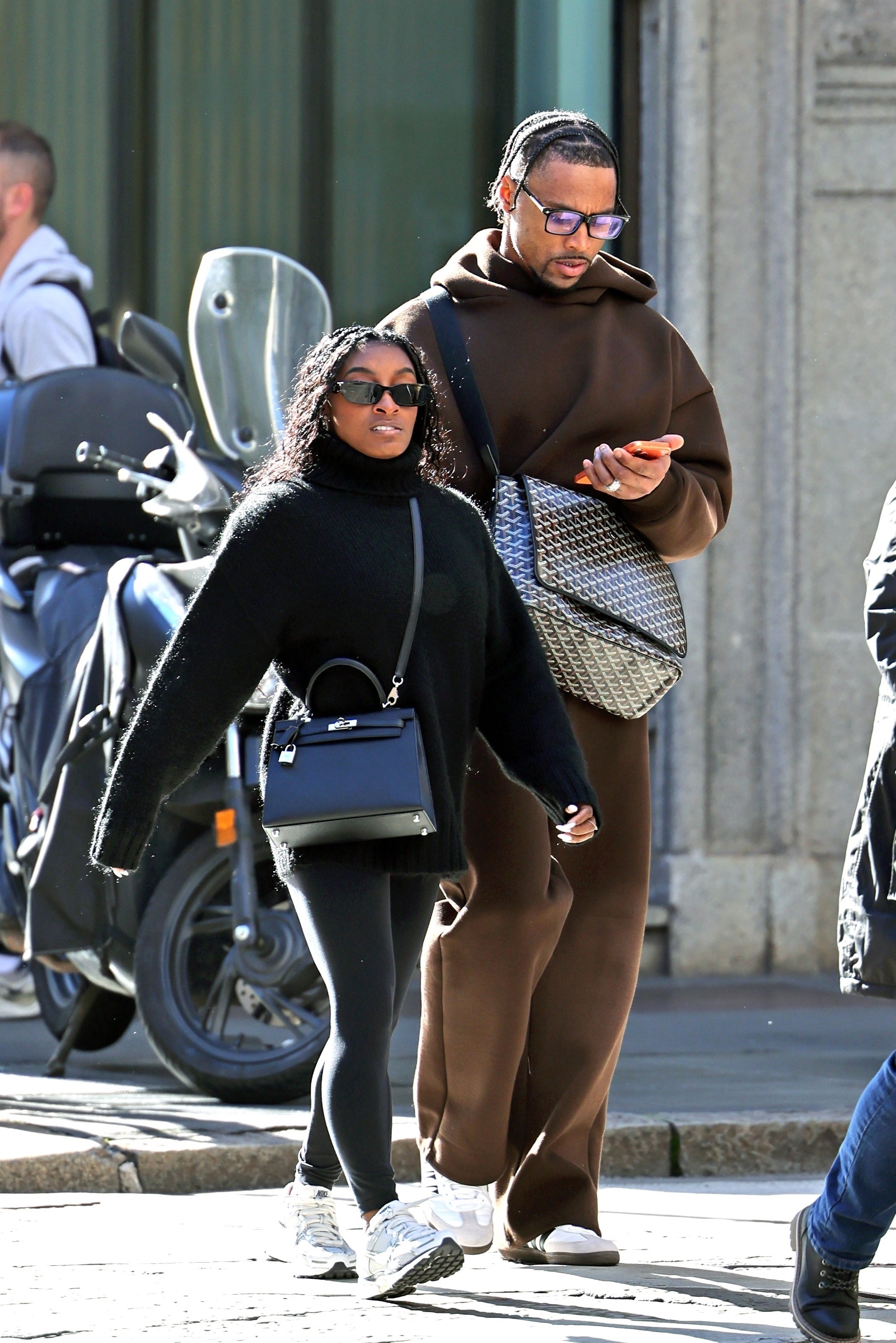 Simone Biles was spotted during the Winter Olympics in Milan wearing Nike sneakers and a Herm&amp;egrave;s Kelly bag