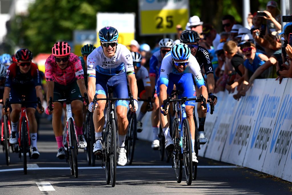 BRUNNEN SWITZERLAND JUNE 15 LR Daryl Impey of South Africa and Team Israel Premier Tech crosses the finishing line beating Michael Matthews of Australia and Team BikeExchange Jayco during the 85th Tour de Suisse 2022 Stage 4 a 1908km stage from Grenchen to Brunnen ourdesuisse2022 WorldTour on June 15 2022 in Brunnen Switzerland Photo by Tim de WaeleGetty Images