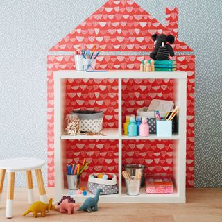 Childrens room with toys on display and stored on shelves and boxes