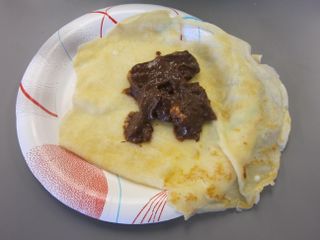 Mock Mars cooks make a coconut crepe.