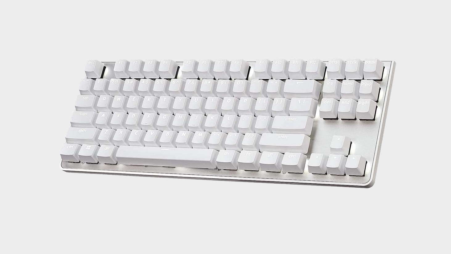 White G.Skill KM360 gaming keyboard on grey background