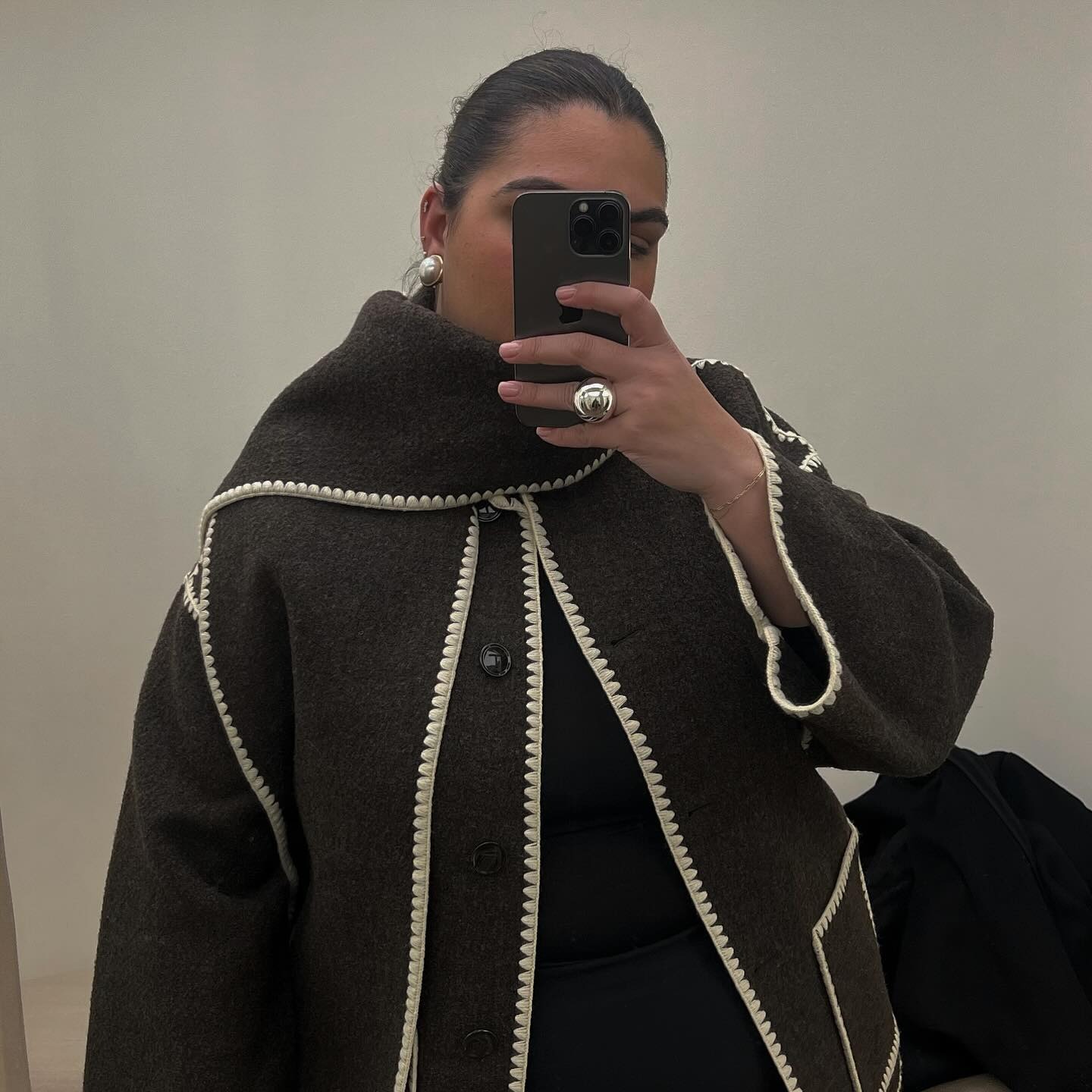 Who What Wear editor Ana Escalante wears brown Toteme scarf jacket.