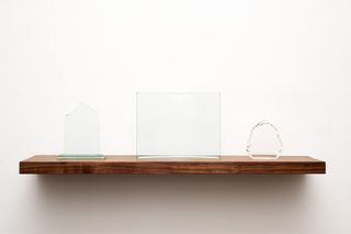 Glass trophies, walnut shelf