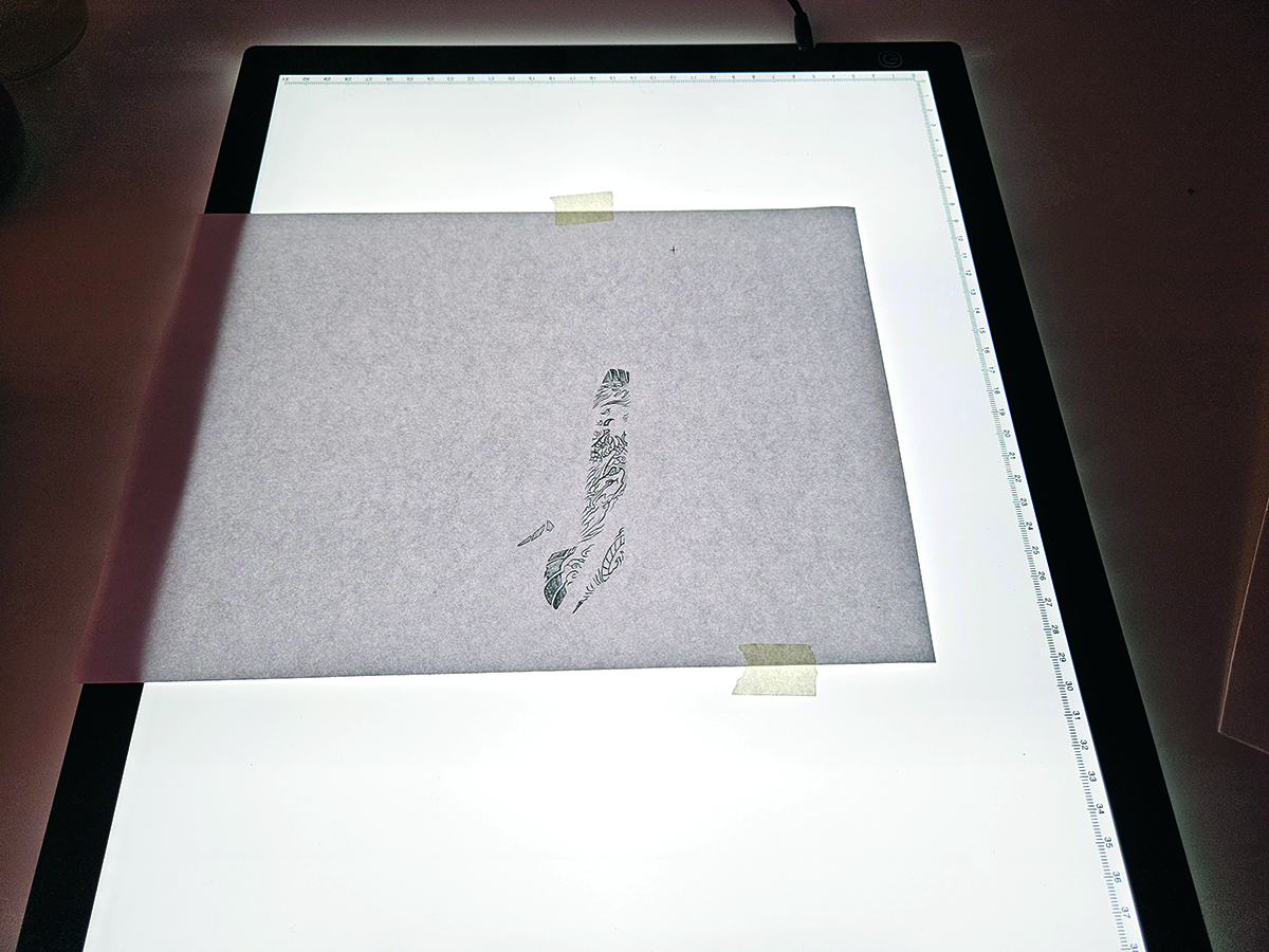 Watercolour geisha; tracing on a light table