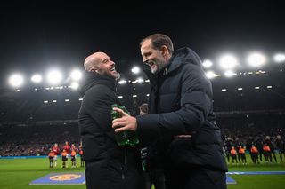 Erik ten Hag and Thomas Tuchel share a joke ahead of a Champions League clash between Manchester United and Bayern Munich in December 2023.