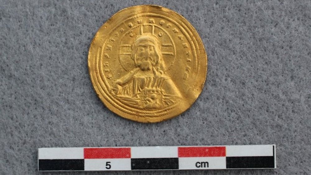 A gold coin depicting Jesus Christ. 