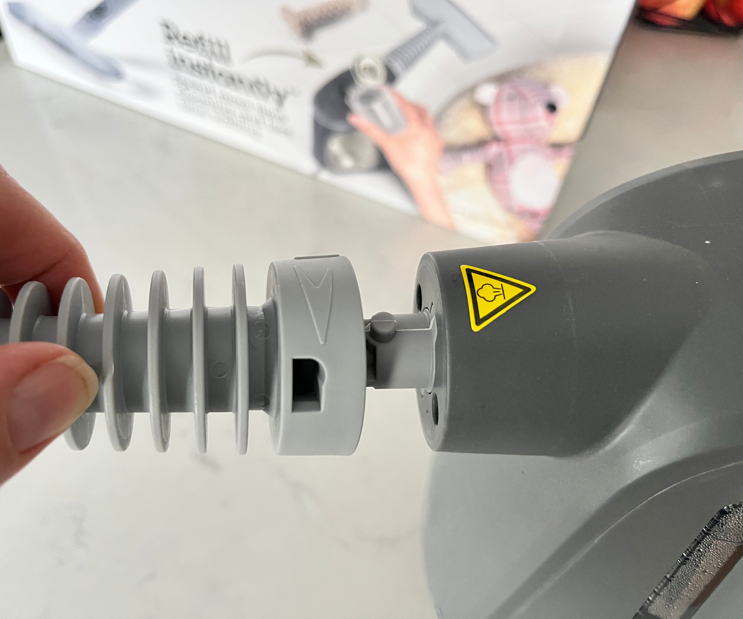 nozzle being attached to steam cleaner