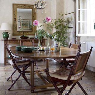 dining room with wooden flooring and wooden dining table