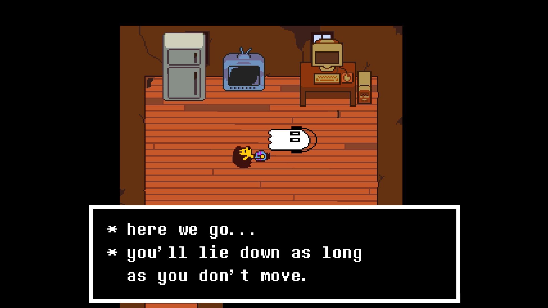 Undertale - The main character lays on the ground beside a ghost. A text box says "Here we go...you'll lie down as long as you don't move."