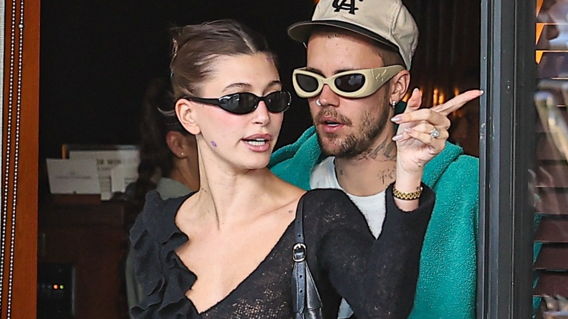 Hailey Bieber Accessorizes Her Sheer Outfit With a $2,450 Gucci Bag and The Row Mules