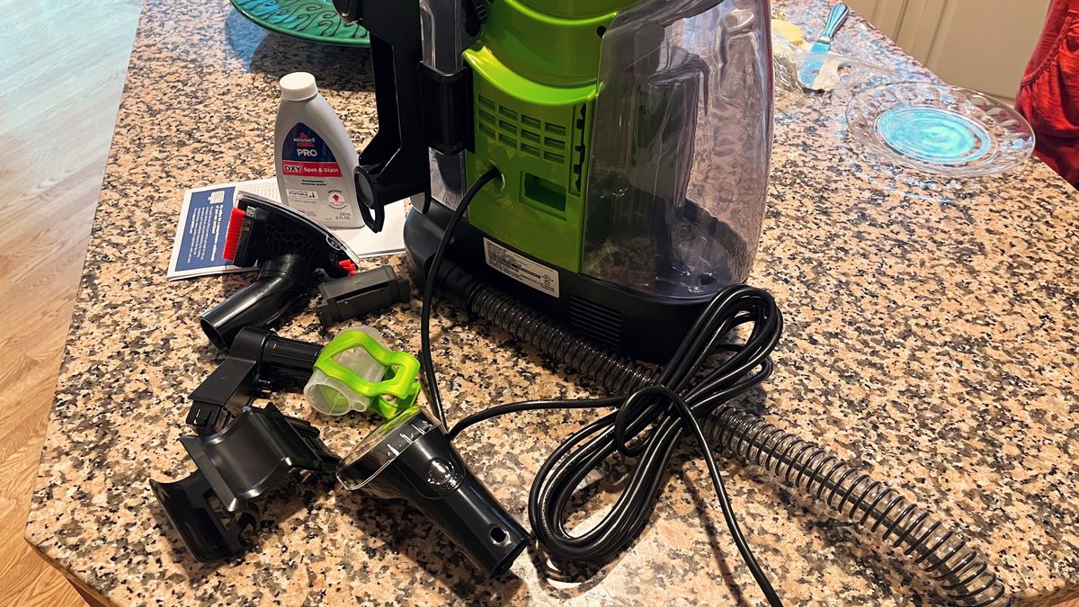 Bissell Little Green ProHeat Portable Carpet Cleaner being tested in writer's home