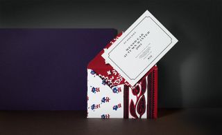 invitation in a paisley-printed envelope that concealed a gold-edged card