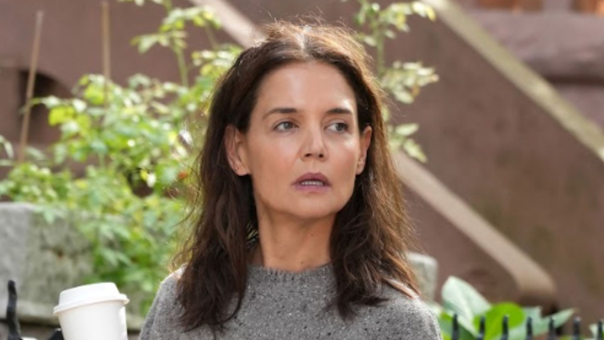 Katie Holmes in VIVAIA's knee high ADIA boots