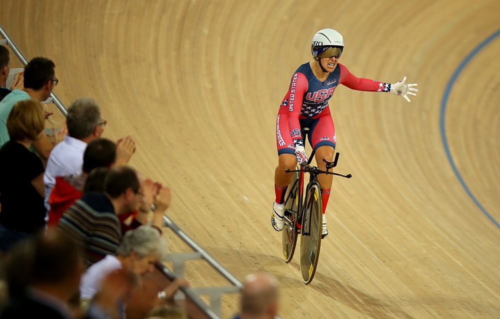 Sarah Hammer of USA celebrates after winning the Women's Team Pursuit final during