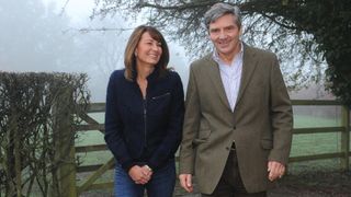 Carole and Michael Middleton smile outside their Berkshire home as they make a statement on the engagement of their daughter Kate to Prince William in 2010